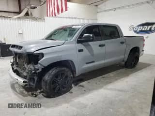 2020 Toyota Tundra SR5 с VIN 5TFEY5F14LX261476, выставлен на аукционе Copart как лот 70022205 с пробегом 180 181 миль миль и Списание • Salvage title. История ставок и продаж доступна на DreamBid. Изображение 1.