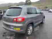 2011 Volkswagen Tiguan SE with VIN WVGAV7AX4BW515069, listed as a IAAI auction lot 41813579 with 100,644 mi miles and . Bid and sale history available at DreamBid. Image 4.