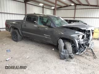 2020 Toyota Tacoma SR5 with VIN 3TMAZ5CN6LM135922, listed as a IAAI auction lot 42752239 with 75,463 mi miles and . Bid and sale history available at DreamBid. Image 1.