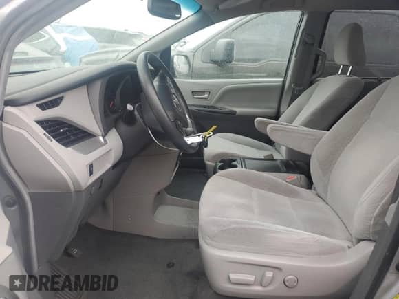 2017 Toyota Sienna LE with VIN 5TDKZ3DC9HS898496, listed as a Copart auction lot 84994035 with 158,183 mi miles and Salvage title. Bid and sale history available at DreamBid. Image 7.