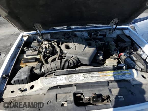 2000 Ford Explorer Sport z VIN 1FMYU60E4YUA88069, wystawiony jako Copart lot #48804015 z przebiegiem 122 071 mil mil oraz Szkoda całkowita • Salvage title. Historia ofert i sprzedaży dostępna na DreamBid. Obrazek 14.