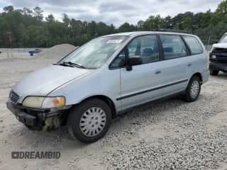 1997 Honda Odyssey LX с VIN JHMRA1868VC020262, выставлен на аукционе Copart как лот 69304674 с пробегом 138 050 миль миль и Списание • Salvage title. История ставок и продаж доступна на DreamBid. Изображение 1.