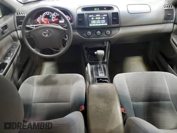 2005 Toyota Camry STD с VIN 4T1BE32K75U620317, выставлен на аукционе Copart как лот 86727525 с пробегом 131 717 миль миль и Списание • Salvage title. История ставок и продаж доступна на DreamBid. Изображение 8.