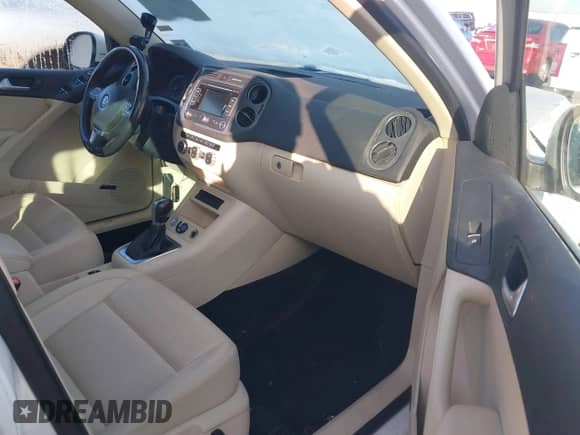 2014 Volkswagen Tiguan SEL with VIN WVGAV3AX8EW538318, listed as a IAAI auction lot 41277703 with 130,827 mi miles and . Bid and sale history available at DreamBid. Image 5.