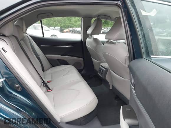 2021 Toyota Camry Hybrid XLE with VIN 4T1F31AK8MU563752, listed as a IAAI auction lot 42134620 with 19,484 mi miles and . Bid and sale history available at DreamBid. Image 8.