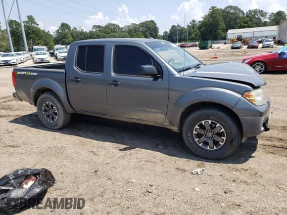 2016 Nissan Frontier Desert Runner with VIN 1N6AD0ER8GN792909, listed as a Copart auction lot 69544525 with 197,095 mi miles and Salvage title. Bid and sale history available at DreamBid. Image 4.