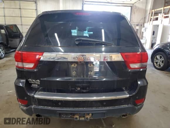 2013 Jeep Grand Cherokee Limited с VIN 1C4RJFBT4DC545458, выставлен на аукционе Copart как лот 68581645 с пробегом 119 383 миль миль и На запчасти • Non repairable. История ставок и продаж доступна на DreamBid. Изображение 6.