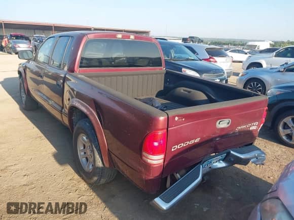 2003 Dodge Dakota SLT with VIN 1D7HL48N53S172265, listed as a IAAI auction lot 43190756 with 97,201 mi miles and . Bid and sale history available at DreamBid. Image 6.