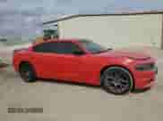 2018 Dodge Charger SXT with VIN 2C3CDXBGXJH119406, listed as a Copart auction lot 89819295 with 124,136 mi miles and Salvage title. Bid and sale history available at DreamBid. Image 4.