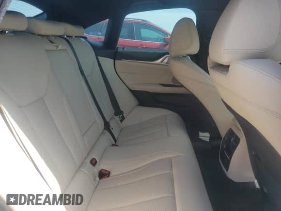 2023 BMW i4 M50 with VIN WBY33AW07PFP22928, listed as a Copart auction lot 65717325 with 62,412 mi miles and Salvage title. Bid and sale history available at DreamBid. Image 10.