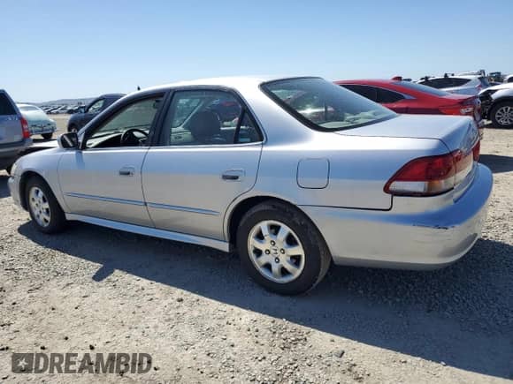 2002 Honda Accord EX with VIN JHMCG66012C021216, listed as a Copart auction lot 48795965 with 257,025 mi miles and Salvage title. Bid and sale history available at DreamBid. Image 2.