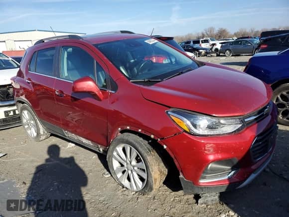 2020 Chevrolet Trax Premier with VIN 3GNCJRSB7LL120275, listed as a Copart auction lot 84662364 with 77,110 mi miles and Salvage title. Bid and sale history available at DreamBid. Image 4.