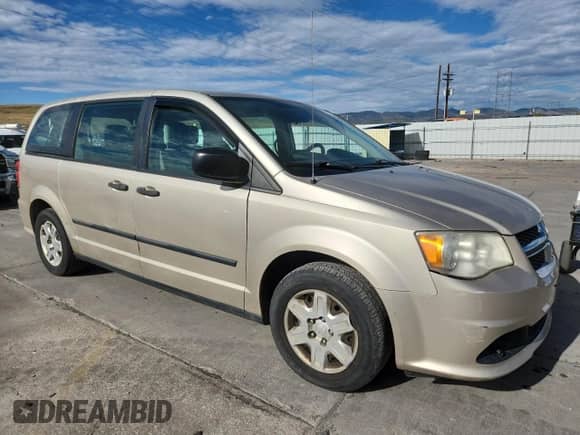 2012 Dodge Grand Caravan SE z VIN 2C4RDGBG1CR311820, wystawiony jako Copart lot #86188175 z przebiegiem 149 362 mil mil oraz Czysty tytuł • Clean title. Historia ofert i sprzedaży dostępna na DreamBid. Obrazek 4.