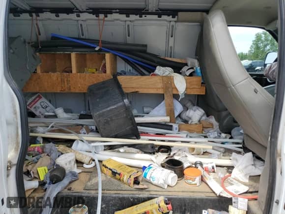 2019 Chevrolet Express Cargo с VIN 1GCWGBFP7K1184095, выставлен на аукционе Copart как лот 59886845 с пробегом 136 345 миль миль и Списание • Salvage title. История ставок и продаж доступна на DreamBid. Изображение 11.