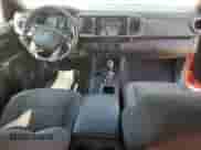 2016 Toyota Tacoma SR5 с VIN 5TFSZ5AN9GX034770, выставлен на аукционе Copart как лот 80369455 с пробегом 67 690 миль миль и Списание • Salvage title. История ставок и продаж доступна на DreamBid. Изображение 8.