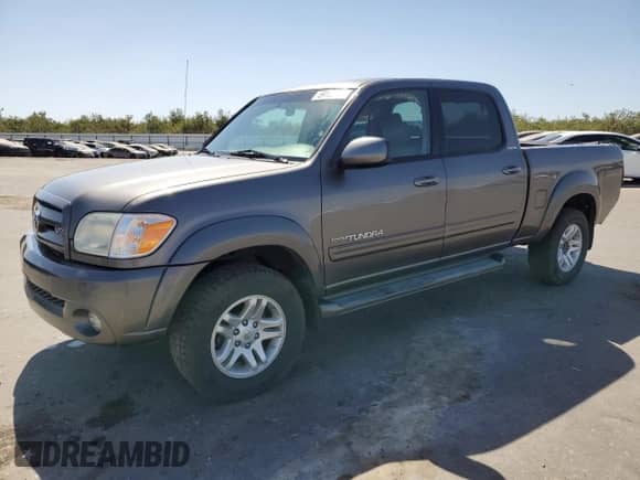 2006 Toyota Tundra Limited z VIN 5TBET38106S513582, wystawiony jako Copart lot #69153895 z przebiegiem 141 292 mil mil oraz Szkoda całkowita • Salvage title. Historia ofert i sprzedaży dostępna na DreamBid. Obrazek 1.