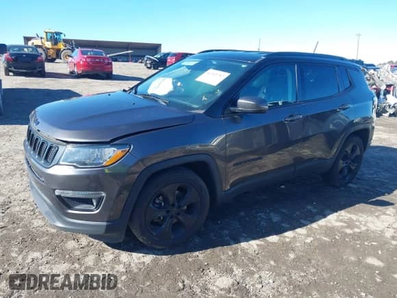 2020 Jeep Compass Latitude with VIN 3C4NJCBB8LT141103, listed as a IAAI auction lot 41263757 with 128,272 mi miles and . Bid and sale history available at DreamBid. Image 2.