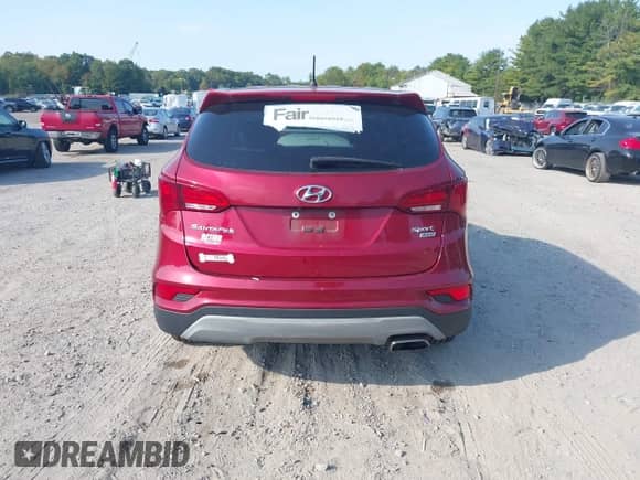 2018 Hyundai Santa Fe 2.4L z VIN 5XYZTDLB2JG556213, wystawiony jako IAAI lot #43272986 z przebiegiem 105 475 mil mil oraz . Historia ofert i sprzedaży dostępna na DreamBid. Obrazek 16.