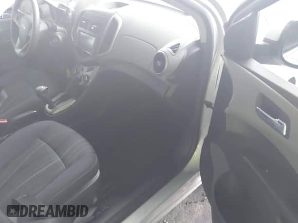 2015 Chevrolet Sonic LT with VIN 1G1JC5SG4F4163618, listed as a IAAI auction lot 43010786 with 73,208 mi miles and . Bid and sale history available at DreamBid. Image 5.