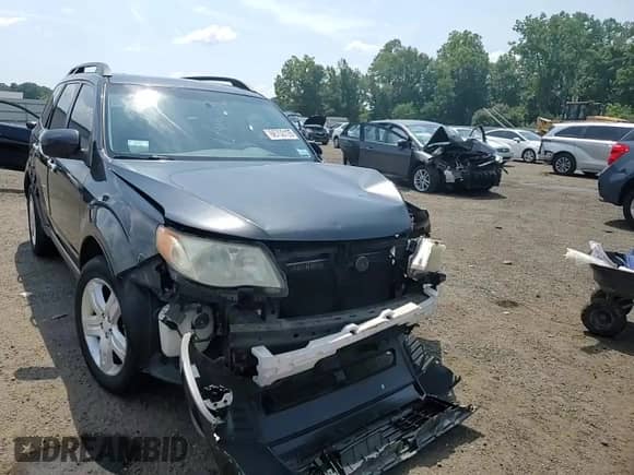 2009 Subaru Forester X with VIN JF2SH63669H733786, listed as a Copart auction lot 66750105 with 153,891 mi miles and Salvage title. Bid and sale history available at DreamBid. Image 13.