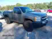 2013 Chevrolet Silverado 1500 Work Truck z VIN 1GCNCPEX1DZ359158, wystawiony jako IAAI lot #43131471 z przebiegiem 128 926 mil mil oraz . Historia ofert i sprzedaży dostępna na DreamBid. Obrazek 1.