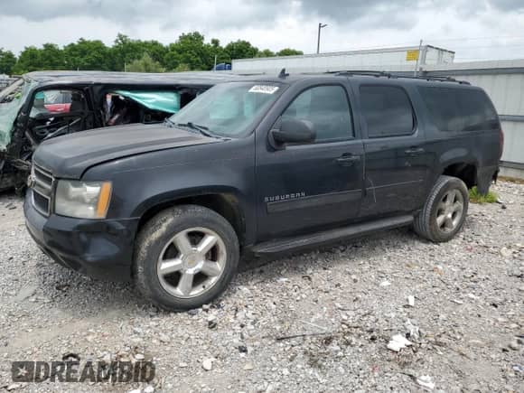 2011 Chevrolet Suburban LS with VIN 1GNSKHE37BR355760, listed as a Copart auction lot 60848905 with 121,065 mi miles and Salvage title. Bid and sale history available at DreamBid. Image 1.