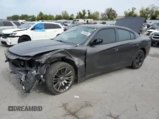 2015 Dodge Charger SE with VIN 2C3CDXBG4FH878706, listed as a Copart auction lot 81408265 with 178,546 mi miles and Salvage title. Bid and sale history available at DreamBid. Image 1.