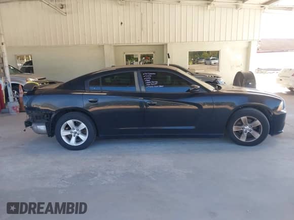 2012 Dodge Charger SE z VIN 2C3CDXBGXCH203339, wystawiony jako IAAI lot #43424829 z przebiegiem 121 586 mil mil oraz . Historia ofert i sprzedaży dostępna na DreamBid. Obrazek 14.