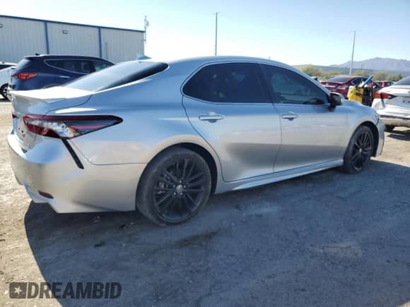 2023 Toyota Camry Hybrid XSE с VIN 4T1K31AKXPU609407, выставлен на аукционе Copart как лот 66486835 с пробегом 26 892 миль миль и Списание • Salvage title. История ставок и продаж доступна на DreamBid. Изображение 3.