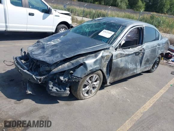 2012 Honda Accord LX Premium with VIN 1HGCP2F42CA058481, listed as a IAAI auction lot 43137433 with 215,370 mi miles and . Bid and sale history available at DreamBid. Image 2.