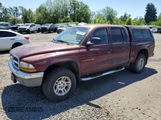 2001 Dodge Dakota with VIN 1B7GG2AZ41S152288, listed as a Copart auction lot 59952635 with 167,721 mi miles and Clean title. Bid and sale history available at DreamBid. Image 1.