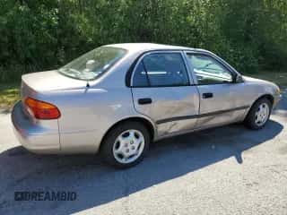2000 Chevrolet Prizm z VIN 1Y1SK5283YZ412788, wystawiony jako Copart lot #63516155 z przebiegiem Nie podano mil oraz Szkoda całkowita • Salvage title. Historia ofert i sprzedaży dostępna na DreamBid. Obrazek 3.