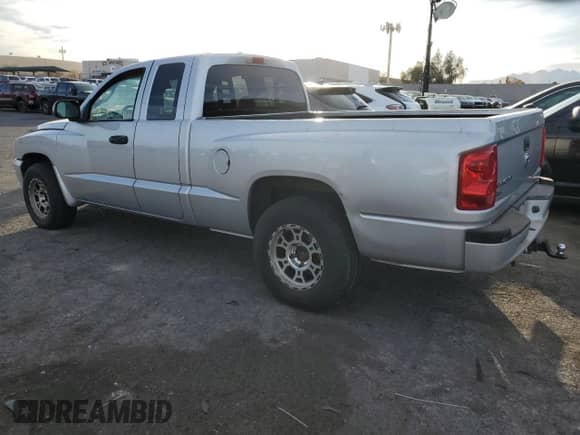 2007 Dodge Dakota SLT с VIN 1D7HE42K47S103100, выставлен на аукционе Copart как лот 44180175 с пробегом 135 012 миль миль и Списание • Salvage title. История ставок и продаж доступна на DreamBid. Изображение 2.