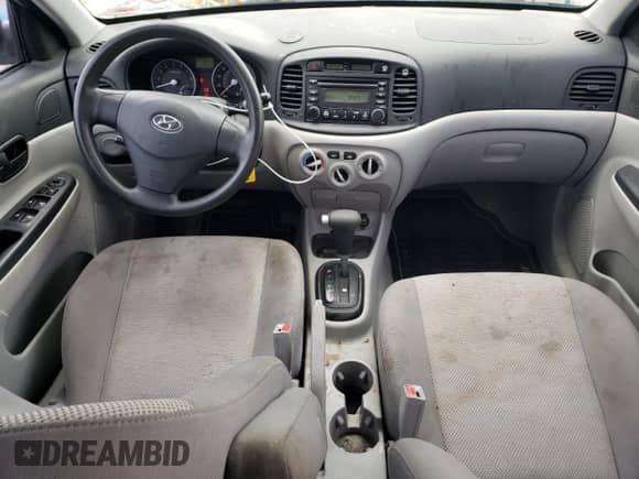2007 Hyundai Accent GLS с VIN KMHCN46CX7U132172, выставлен на аукционе Copart как лот 61669064 с пробегом 220 897 миль миль и Списание • Salvage title. История ставок и продаж доступна на DreamBid. Изображение 8.