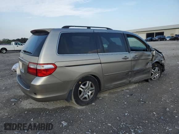 2005 Honda Odyssey EX z VIN 5FNRL384X5B400342, wystawiony jako Copart lot #80887225 z przebiegiem 214 575 mil mil oraz Szkoda całkowita • Salvage title. Historia ofert i sprzedaży dostępna na DreamBid. Obrazek 3.