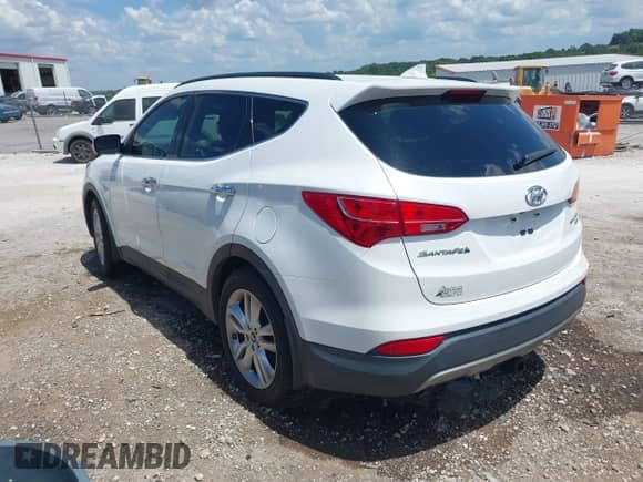 2013 Hyundai Santa Fe Sport with VIN 5XYZUDLA3DG054402, listed as a IAAI auction lot 42863309 with 133,453 mi miles and . Bid and sale history available at DreamBid. Image 3.