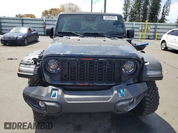 2024 Jeep Wrangler Sport S с VIN 1C4RJXN60RW344769, выставлен на аукционе Copart как лот 52084435 с пробегом 5 546 миль миль и Списание • Salvage title. История ставок и продаж доступна на DreamBid. Изображение 5.