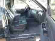 2007 Chevrolet Tahoe LTZ with VIN 1GNFK13027R249676, listed as a IAAI auction lot 43424132 with 296,751 mi miles and . Bid and sale history available at DreamBid. Image 5.