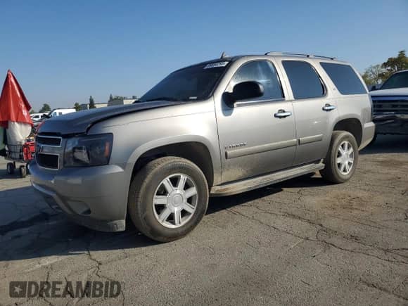 2007 Chevrolet Tahoe LS with VIN 1GNFC13C77R340997, listed as a Copart auction lot 89850295 with 191,302 mi miles and Salvage title. Bid and sale history available at DreamBid. Image 1.