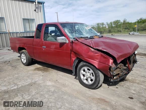 1996 Nissan Frontier XE with VIN 1N6SD16S8TC335129, listed as a Copart auction lot 55884495 with 313,757 mi miles and Salvage title. Bid and sale history available at DreamBid. Image 4.