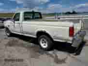 1990 Ford F-150 z VIN 1FTDF15Y5LPA89323, wystawiony jako Copart lot #62608275 z przebiegiem 86 922 mil mil oraz Czysty tytuł • Clean title. Historia ofert i sprzedaży dostępna na DreamBid. Obrazek 2.