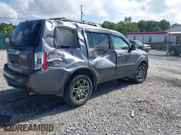 2014 Honda Pilot EX-L with VIN 5FNYF4H54EB023024, listed as a IAAI auction lot 43023941 with 155,356 mi miles and . Bid and sale history available at DreamBid. Image 4.