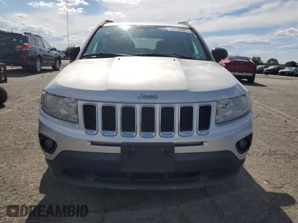 2011 Jeep Compass z VIN 1J4NF1FB1BD280813, wystawiony jako Copart lot #69636485 z przebiegiem 119 032 mil mil oraz Szkoda całkowita • Salvage title. Historia ofert i sprzedaży dostępna na DreamBid. Obrazek 5.