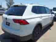 2024 Volkswagen Tiguan SE with VIN 3VVNB7AX4RM198923, listed as a IAAI auction lot 42312597 with 6,827 mi miles and . Bid and sale history available at DreamBid. Image 4.