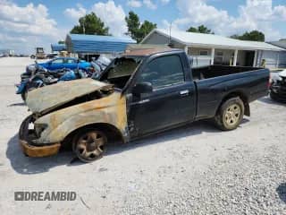 2004 Toyota Tacoma with VIN 5TENL42N04Z435460, listed as a Copart auction lot 69415815 with Not provided miles and Salvage title. Bid and sale history available at DreamBid. Image 1.