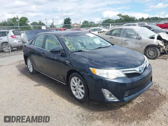 2014 Toyota Camry LE z VIN 4T1BD1FK7EU103357, wystawiony jako IAAI lot #42996785 z przebiegiem 99 532 mil mil oraz . Historia ofert i sprzedaży dostępna na DreamBid. Obrazek 1.