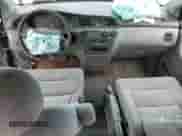 2000 Honda Odyssey EX с VIN 2HKRL186XYH580787, выставлен на аукционе Copart как лот 63162975 с пробегом 283 353 миль миль и Списание • Salvage title. История ставок и продаж доступна на DreamBid. Изображение 8.