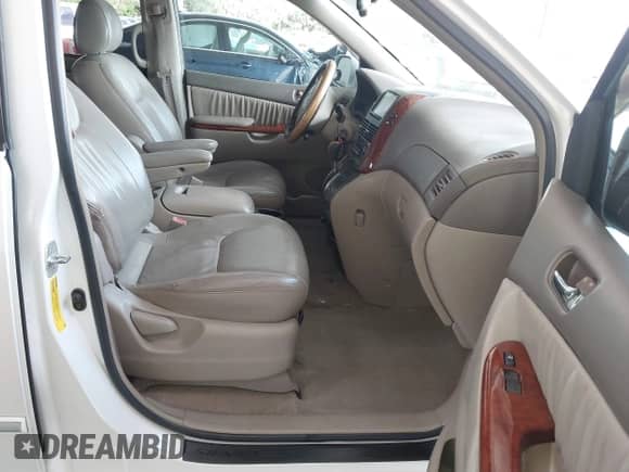 2004 Toyota Sienna XLE z VIN 5TDZA22C14S094612, wystawiony jako IAAI lot #43148930 z przebiegiem 125 471 mil mil oraz . Historia ofert i sprzedaży dostępna na DreamBid. Obrazek 5.