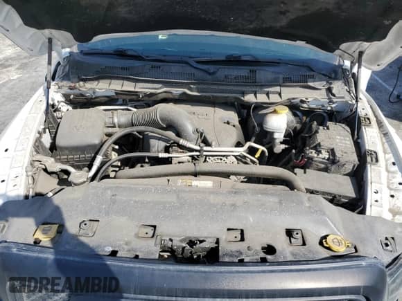 2018 Ram 1500 Rebel z VIN 1C6RR7YT7JS235965, wystawiony jako Copart lot #64030615 z przebiegiem 61 485 mil mil oraz Szkoda całkowita • Salvage title. Historia ofert i sprzedaży dostępna na DreamBid. Obrazek 11.