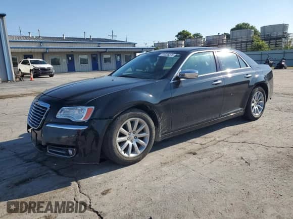 2012 Chrysler 300 Limited z VIN 2C3CCACG2CH242411, wystawiony jako Copart lot #80325775 z przebiegiem 165 492 mil mil oraz Szkoda całkowita • Salvage title. Historia ofert i sprzedaży dostępna na DreamBid. Obrazek 1.